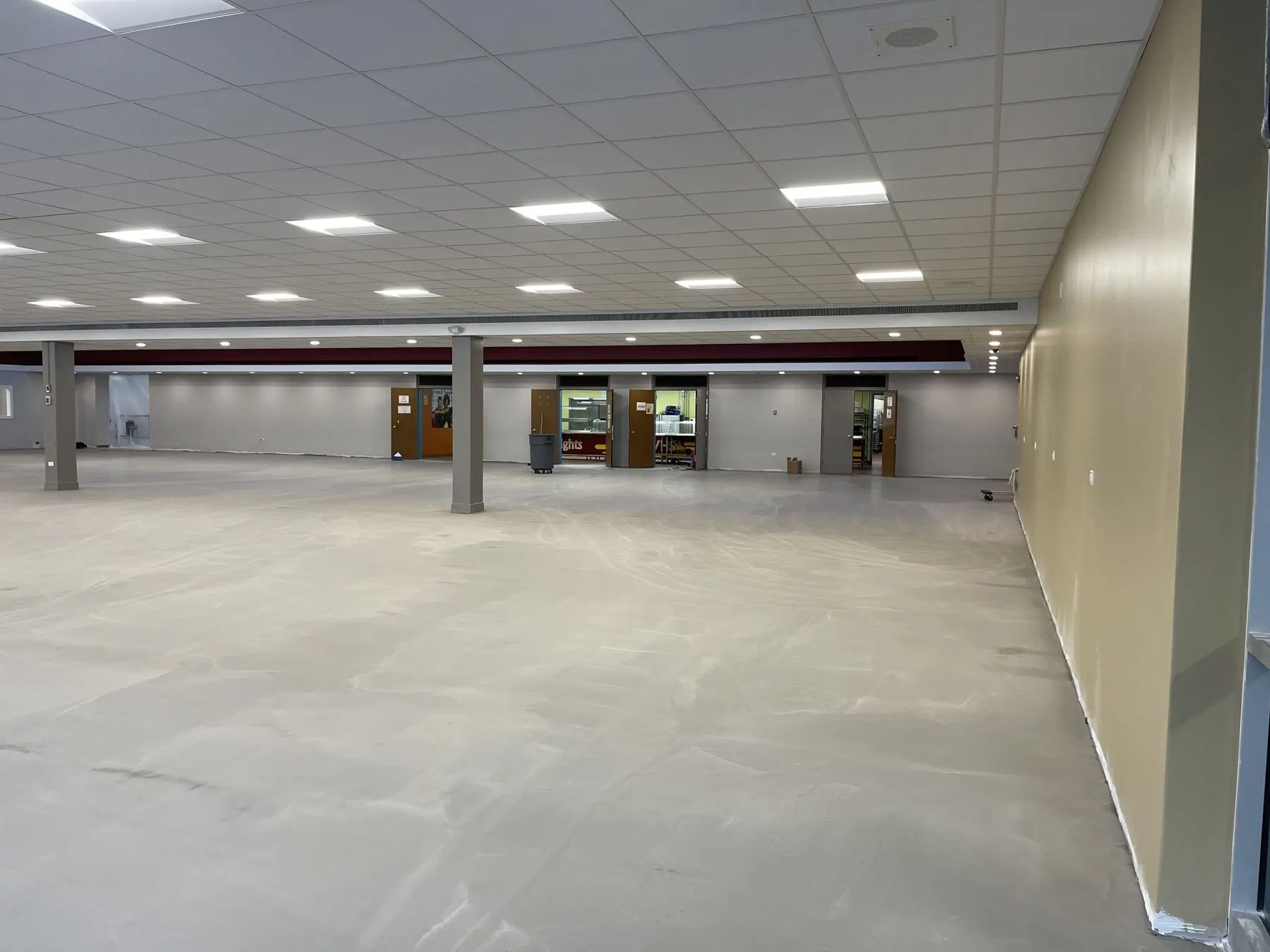 Self-leveling underlayment poured and cured